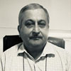 The image is of the Business Head of Jaya Travel & Tours , Mr. Ajay Tanna. It features on the about us page of the company JR Technologies. The company provides innovative business solutions in the travel landscape and beyond.