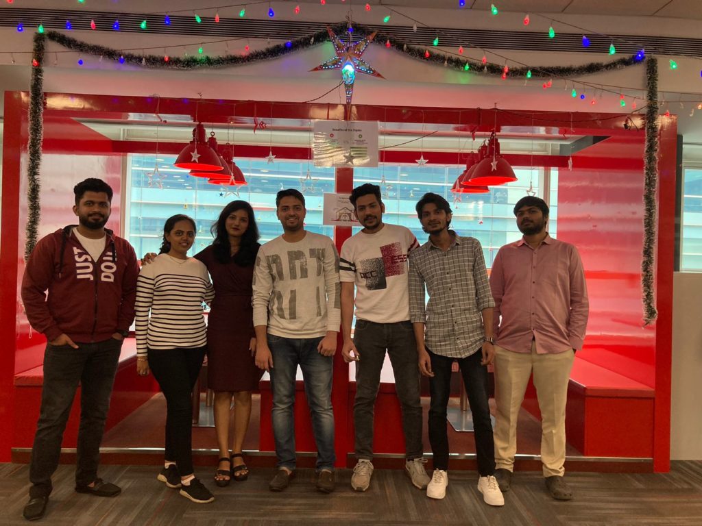 Employees at JR Technologies celebrating Christmas together at the office. It features on the employee engagement page of the company JR Technologies. The company provides innovative business solutions in the travel landscape and beyond.