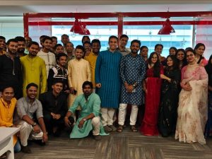 Employees at JR Technologies posing together for Diwali celebrations at the office. It features on the employee engagement page of the company JR Technologies. The company provides innovative business solutions in the travel landscape and beyond.